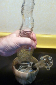 Bong in Hand Copyright 2012 OldHippie@BeyondChronic.com