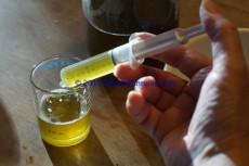 filling calibrated oral syringe BeyondChronic.com